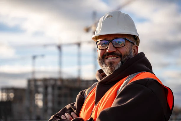 Smiling construction worker on a commercial job site